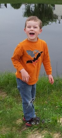 Boy at a pond 2